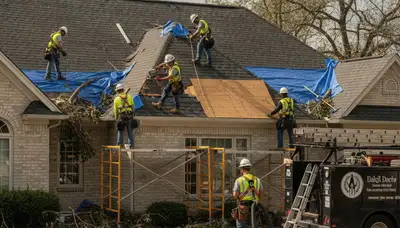 Tuscaloosa, AL storm damage restoration crew repairing water-damaged home after flooding